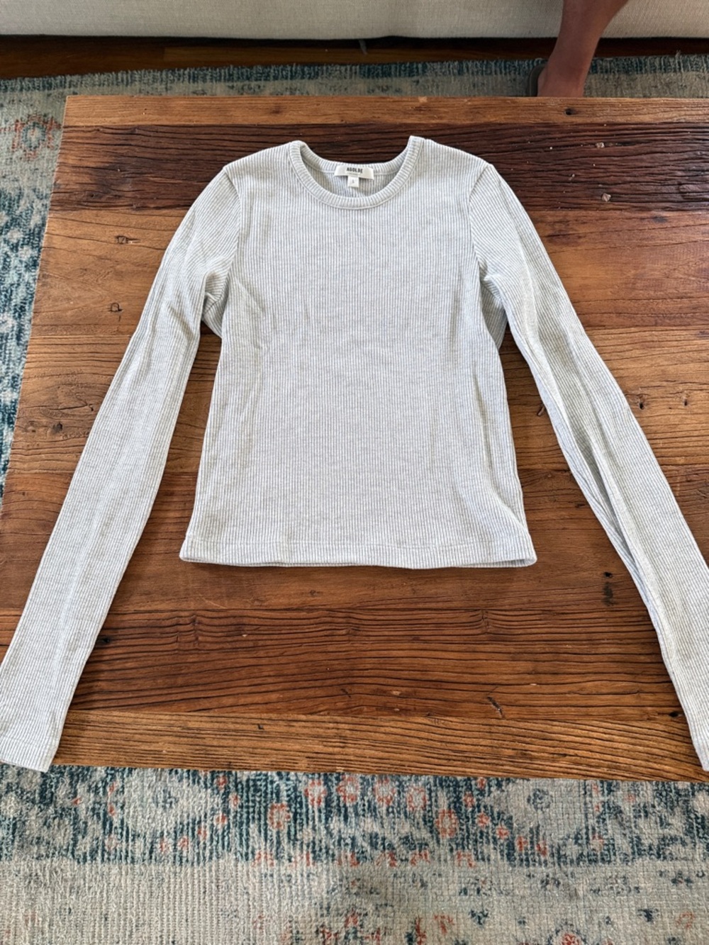 Agolde Black Ribbed Long Sleeve Crew Top with Ruffle Hem